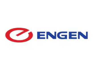 Petrol attendant at Engen garage assisting a customer at the fuel pump in South Africa